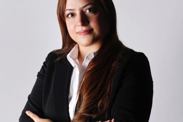 Portrait of Dr. Salwa Alhammadi, a senior executive corporate strategist with an impressive academic background and extensive experience in corporate strategy and leadership. She exudes confidence and professionalism, symbolizing her dedication to her career and leadership development.