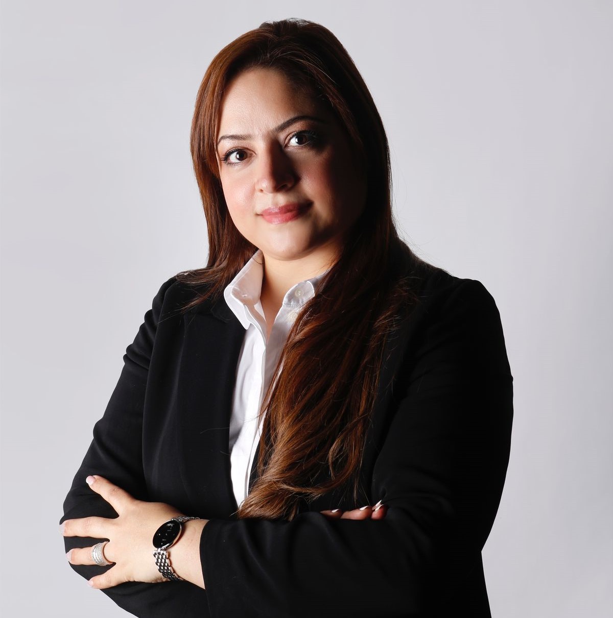 Portrait of Dr. Salwa Alhammadi, a senior executive corporate strategist with an impressive academic background and extensive experience in corporate strategy and leadership. She exudes confidence and professionalism, symbolizing her dedication to her career and leadership development.